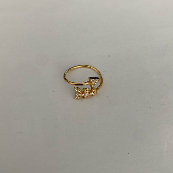 Cute BCBGMAXAZRIA Minimalist Arrow Ring - Gold size 7. Gently used. - Picture 1 of 3